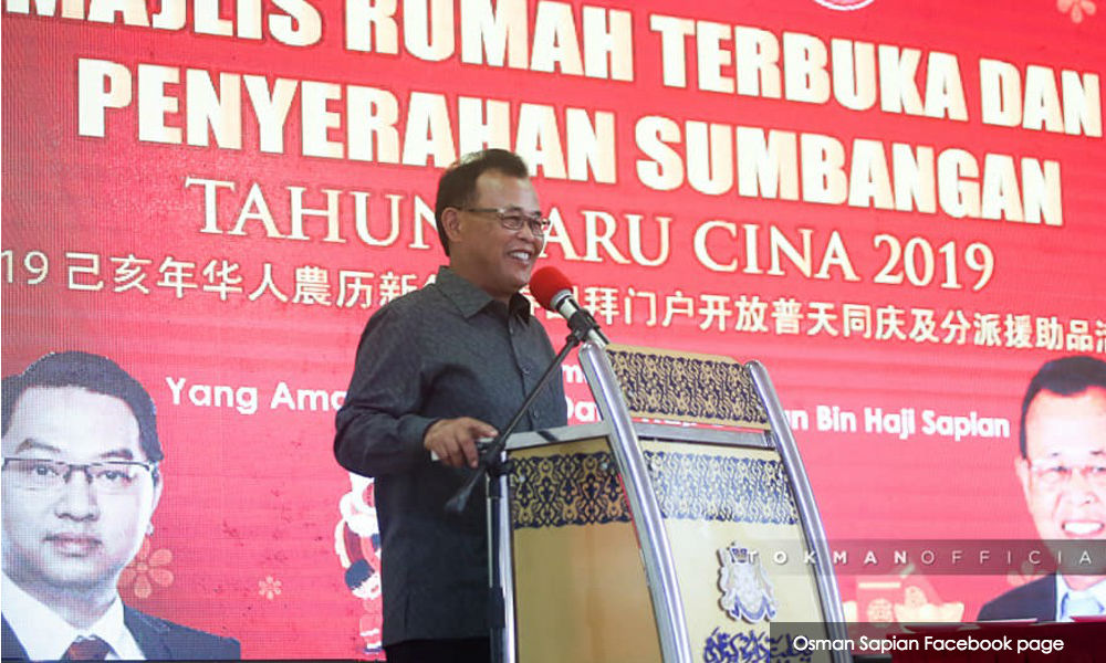 When asked about 'fake' degree, Johor MB merely smiles