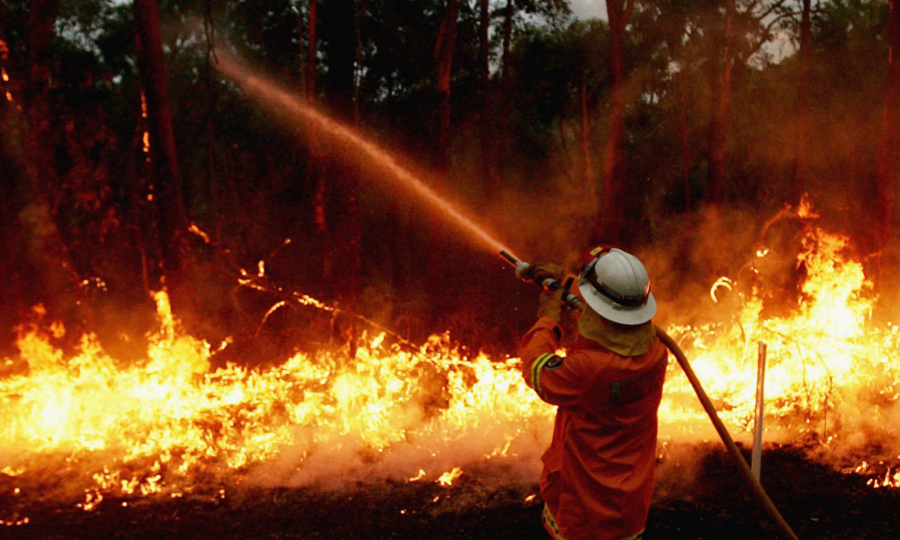 Record heat brings fire to scorched Australia