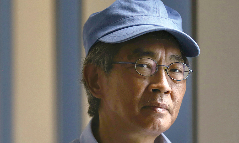 Spectre of extradition law spreads as HK bookseller flees to Taiwan