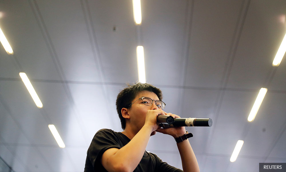 Hong Kong disqualifies democracy activist Joshua Wong from district elections