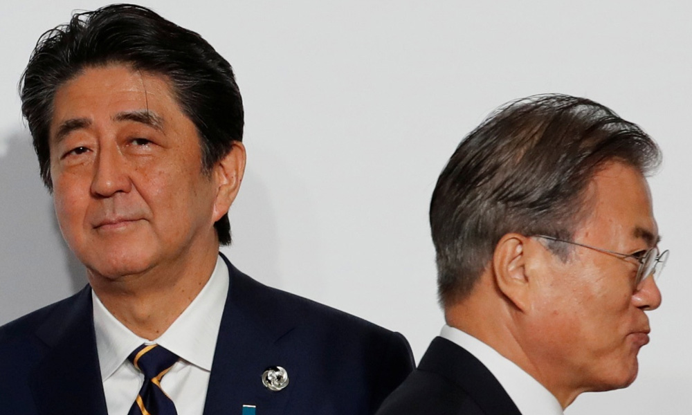 Japan, South Korea raise stakes in dispute over forced labour