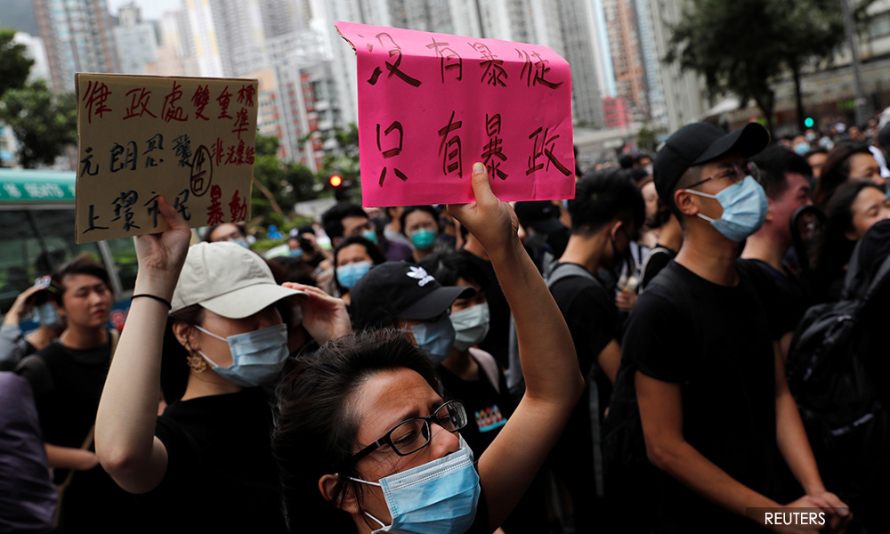 Hong Kong charges 44 protesters with rioting, grants bail