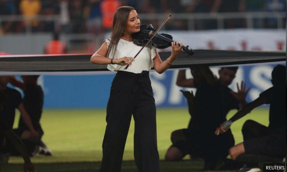 Row over female violinist at soccer match in Iraqi holy city