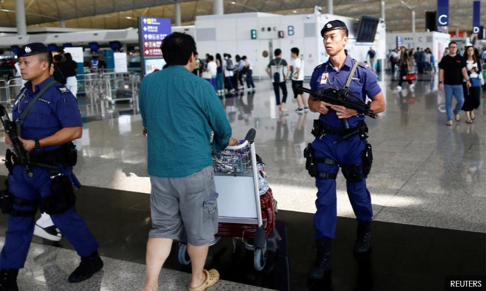 HK protesters offer apologies, China doubles down after airport clash