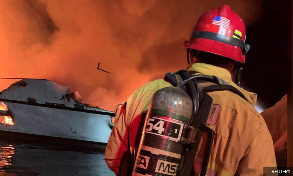 At least eight dead from California boat fire, 26 missing