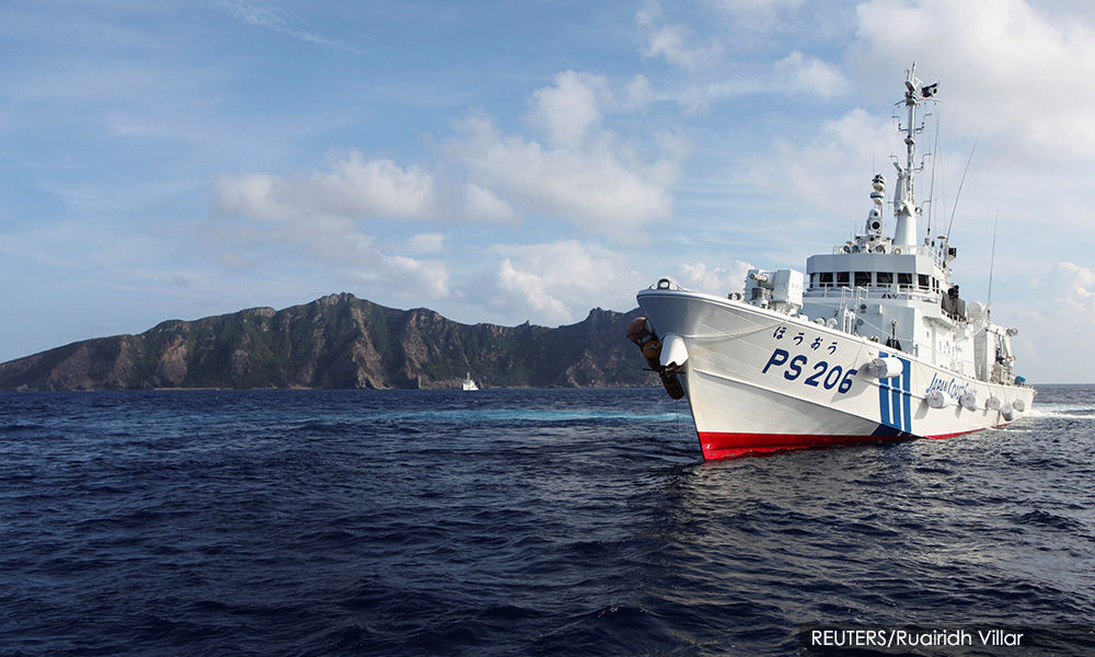 Japan to set up police unit to help defend disputed islets