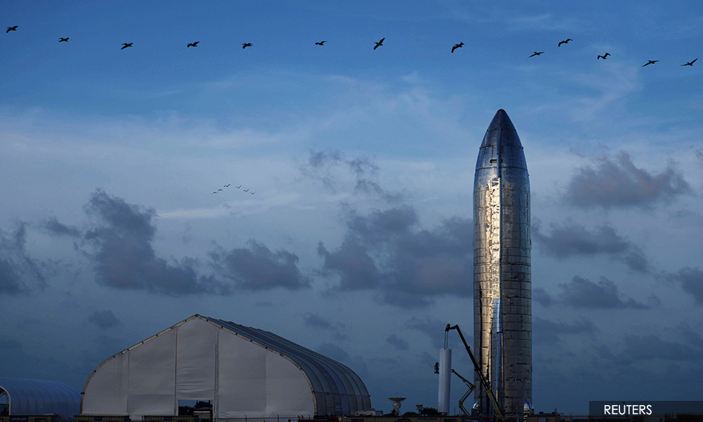 Elon Musk unveils new Mars rocket prototype, expects missions in months