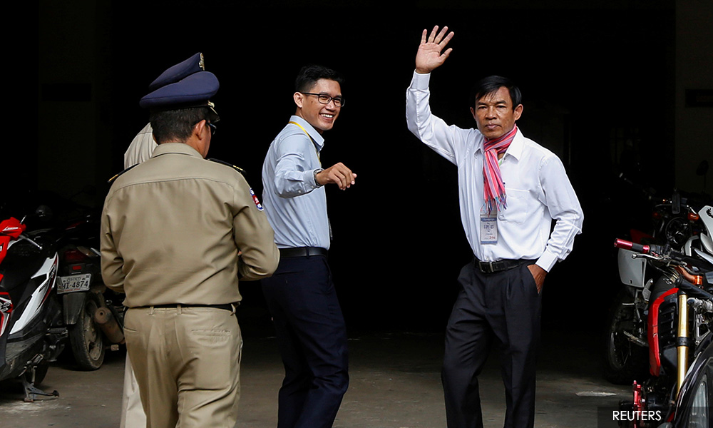 Cambodian judge orders reinvestigation of spying case against reporters