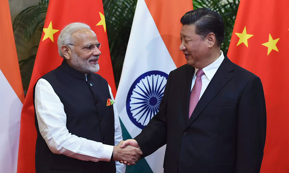Modi to host China's Xi at summit with ties strained by Kashmir