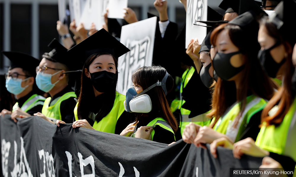 Hong Kong student who fell during protests dies, fresh unrest likely