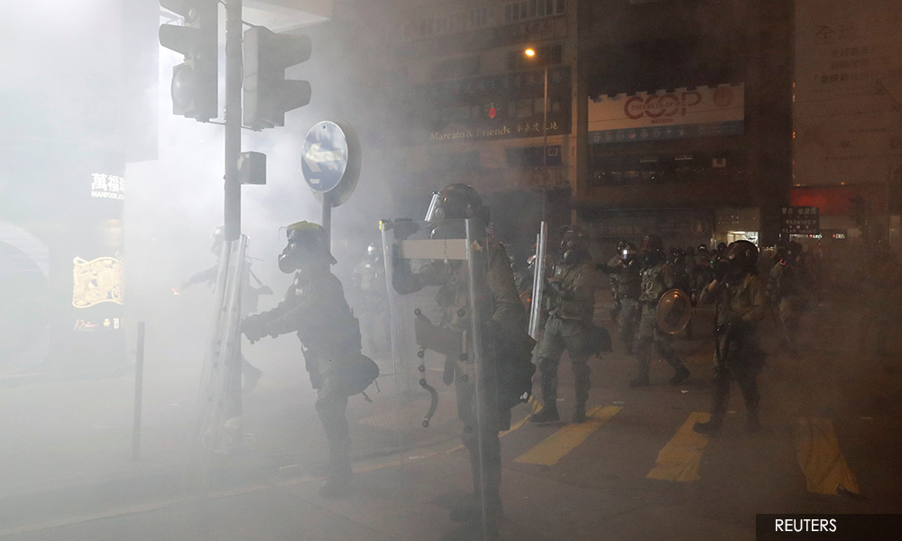 Clean-up operation underway as Hong Kong reels from worst violence in weeks