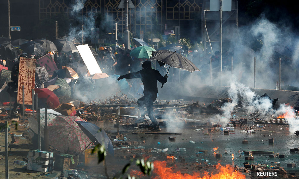 Police fire tear gas to disperse thousands in central Hong Kong