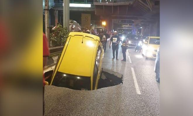 Tanah mendap jejas kereta: Punca paip air pecah - DBKL