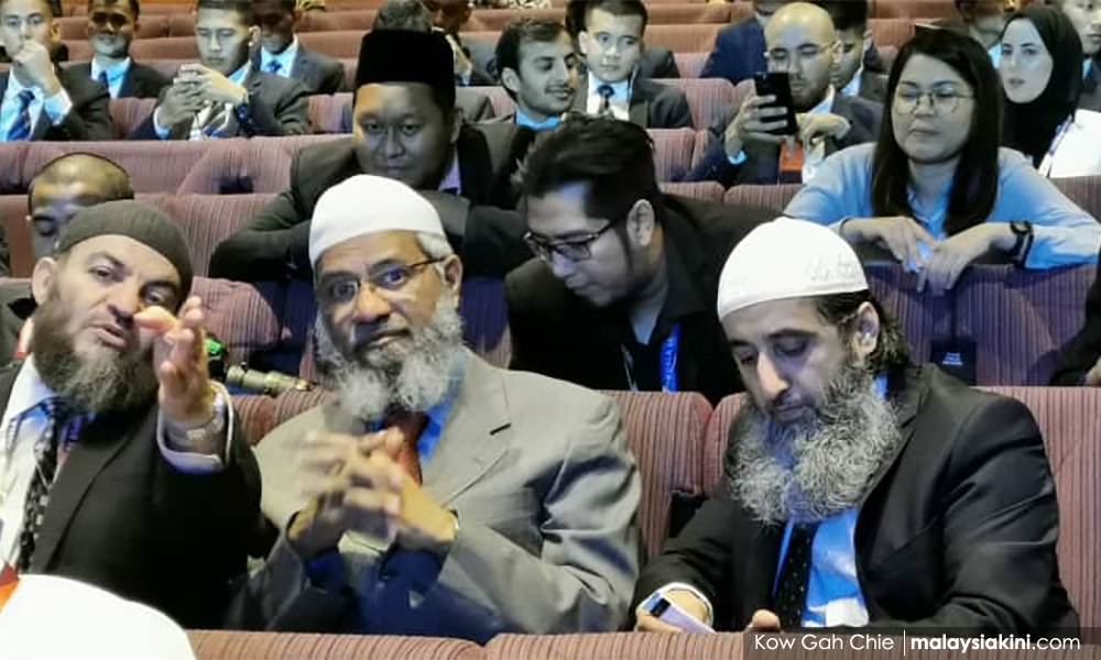 'Merry X'mas' row – Zakir says no Twitter account, Kit Siang wants PR revoked