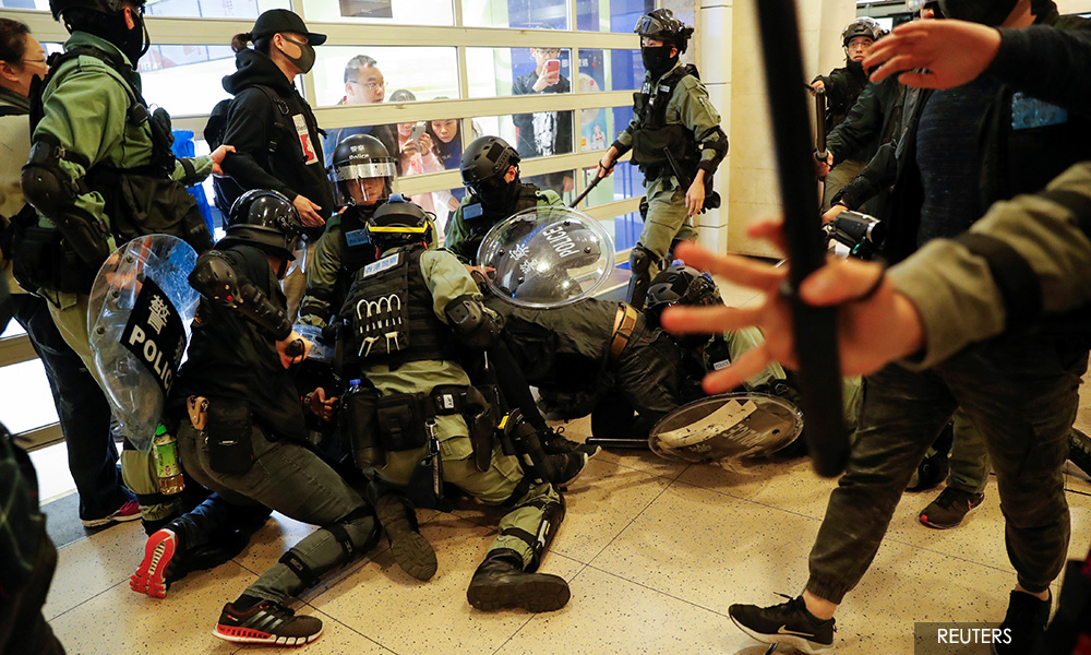 Hong Kong mall protests flare with leader Lam in Beijing