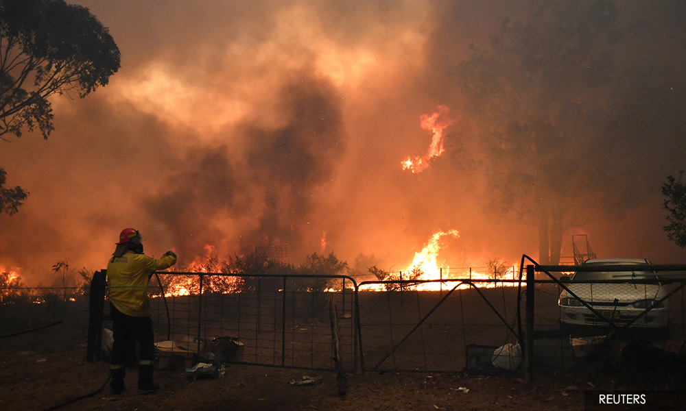 Australian bushfires claim third victim as more than 100 blazes burn