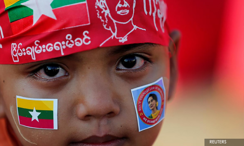 Suu Kyi’s loyalists rally for Myanmar leader before genocide trial