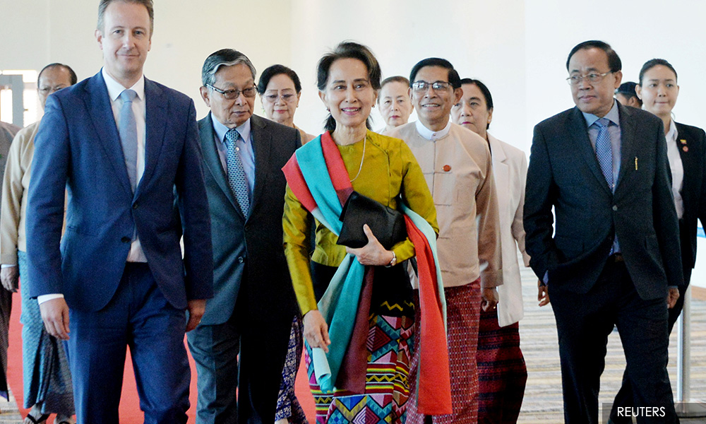 Suu Kyi departs for genocide hearings amid fanfare in Myanmar