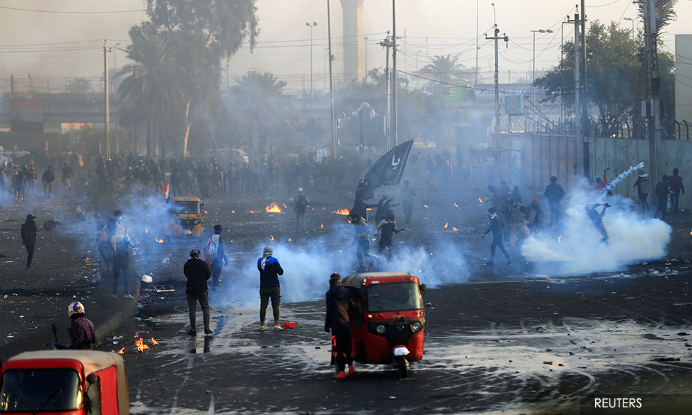 New Iraq PM appeals for support but is rejected by protesters