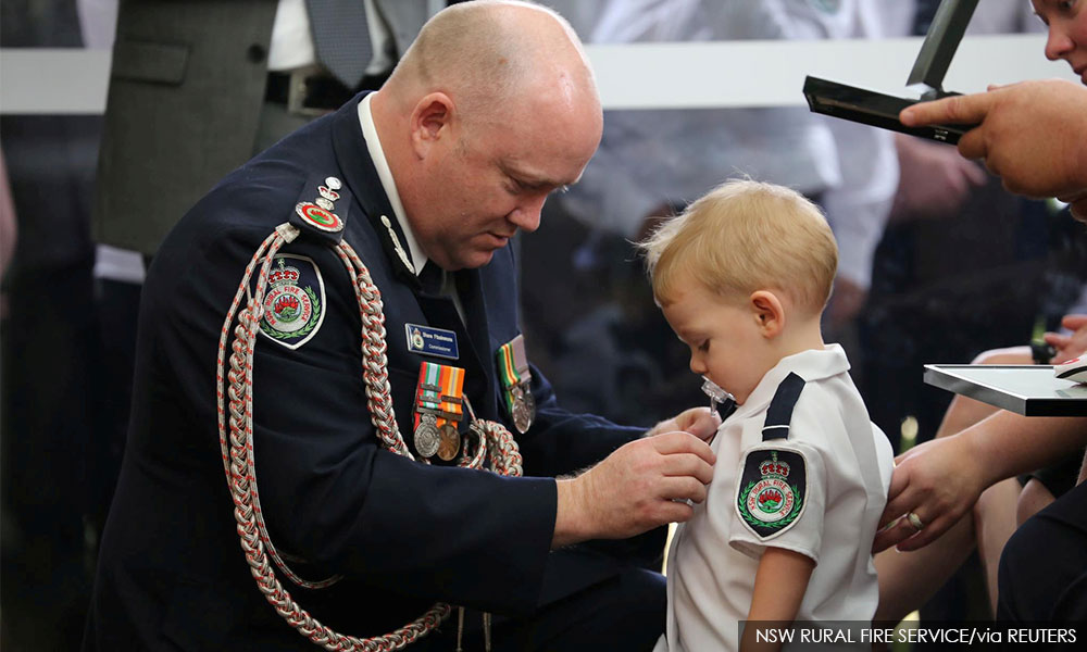 Toddler son receives posthumous medal for killed Australian firefighter