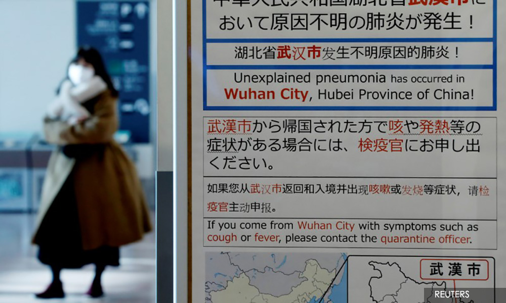 As virus spreads to more Chinese cities, WHO calls emergency meeting