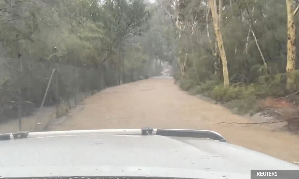 Floods, road closures in Australia as storms lash some bushfire-hit regions