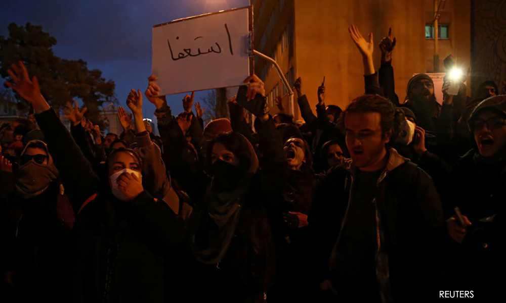 Iran says it has made arrests over plane disaster as protests rage on