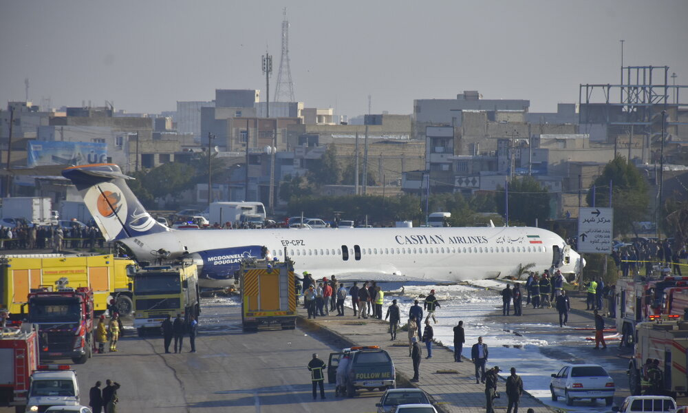 Iranian passenger jet slides off runway into highway, passengers safe