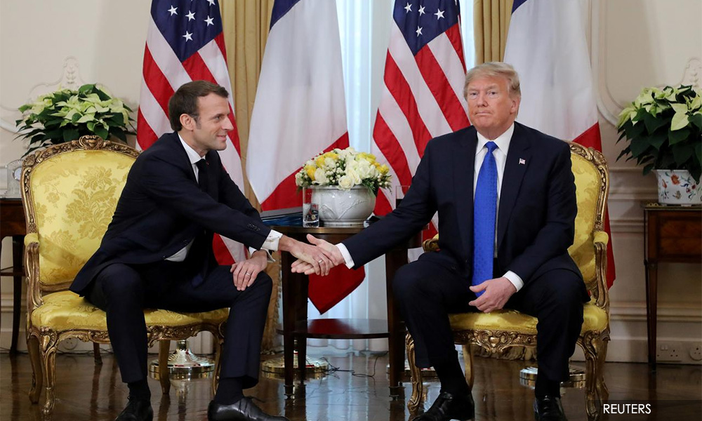 Macron and Trump declare truce in digital tax dispute