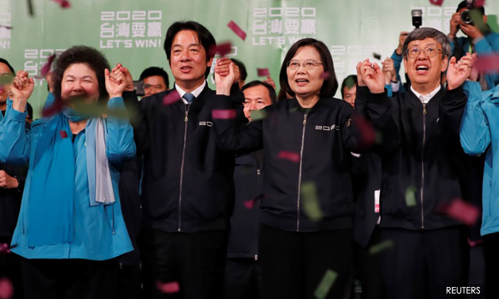 China says won't change position on Taiwan after landslide election