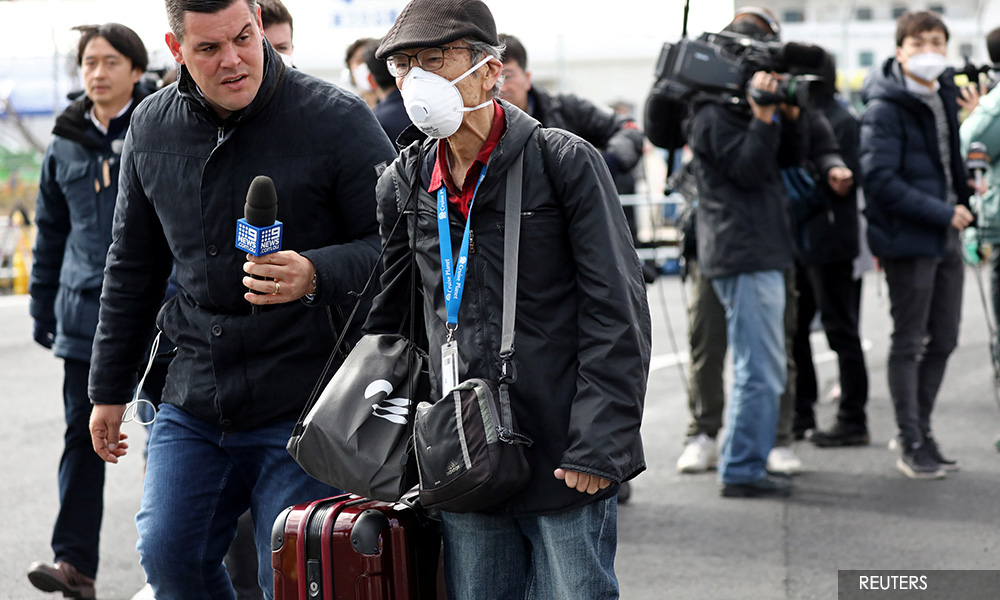 With stricken cruise ship, Japan draws criticism over coronavirus response