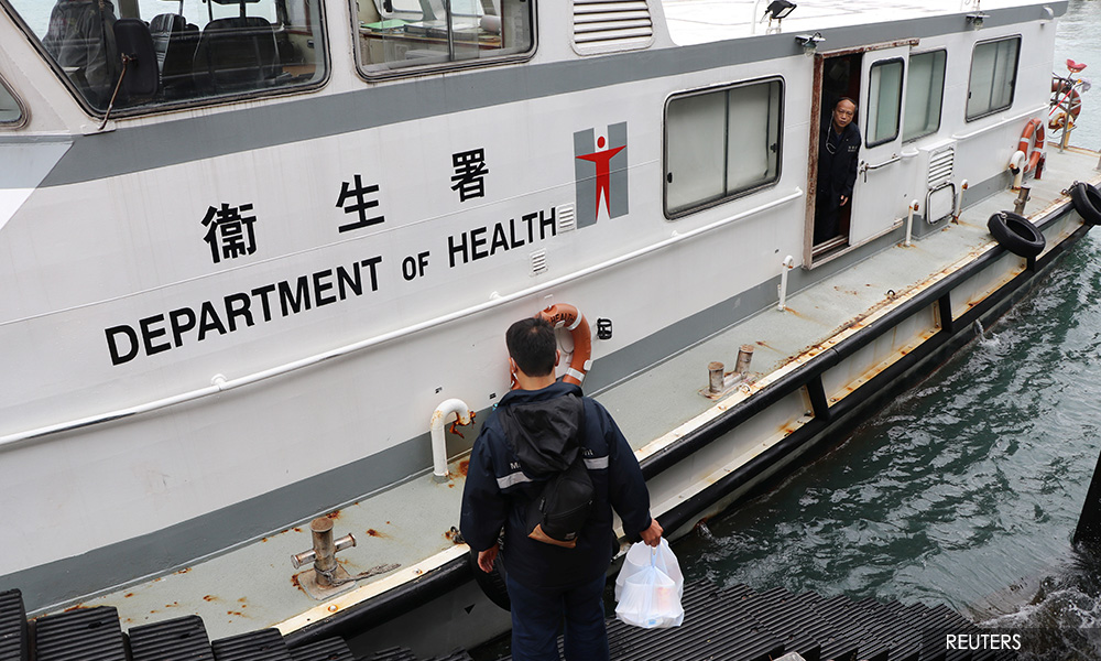 Two cruise ships under quarantine as virus death toll nears 500