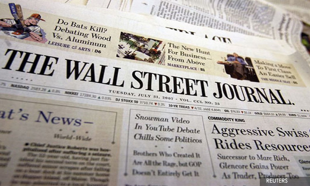 China revokes press credentials of 3 WSJ journalists over opinion piece