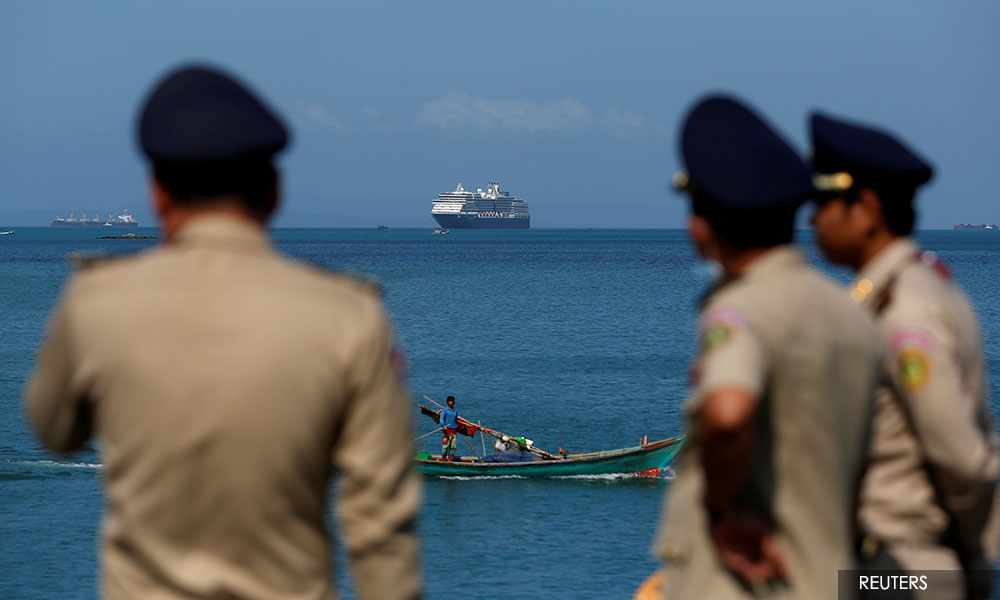 Cruise passengers shunned over coronavirus to head home after Cambodia reprieve