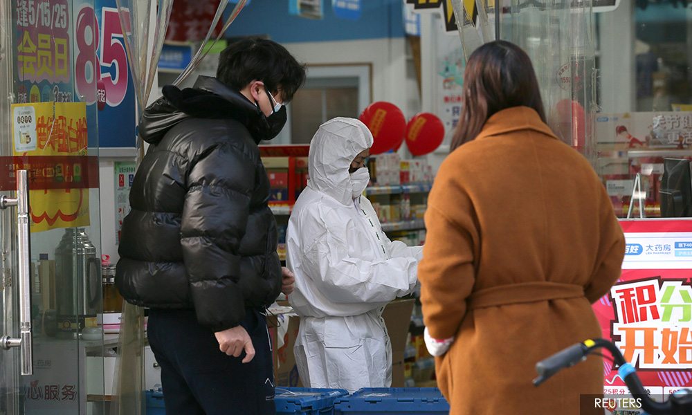 China's coronavirus infections hit daily record, deaths climb to 304