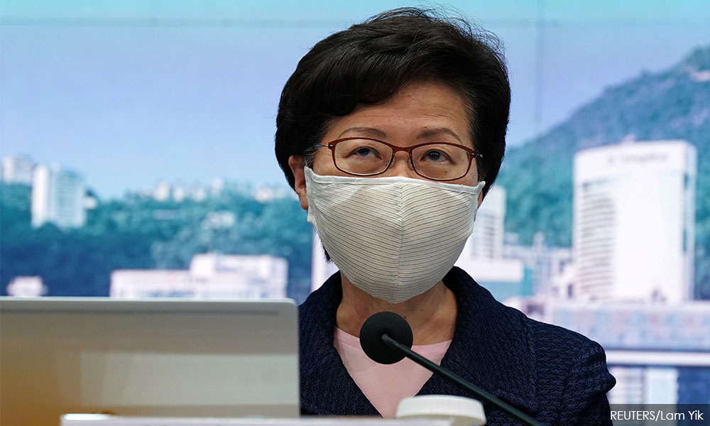 Hong Kong leader says 5th Covid wave has 'overwhelmed' city's capacity