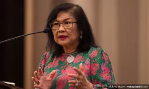 Rafidah: Flex muscles on divisive issues, world is watching