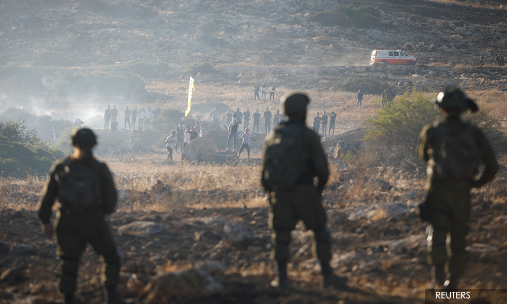Two Palestinians killed in West Bank raids, Palestinians sources say