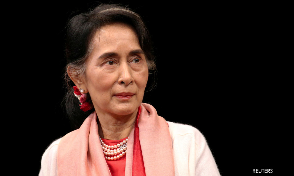 Suu Kyi could return home after verdicts, junta chief says
