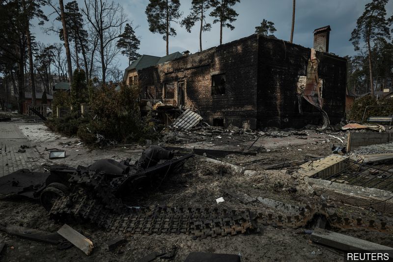 Russia bombards Kyiv outskirts, regroups for offensive in east Ukraine
